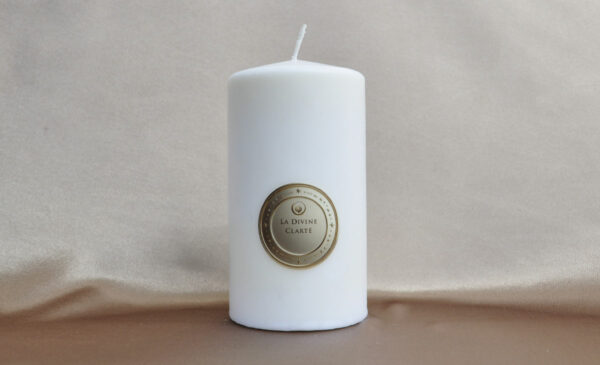 Divine Clarity Candle illuminating a pure and minimalistic space