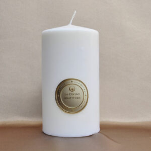 Divine Gratitude Candle radiating a warm and comforting light